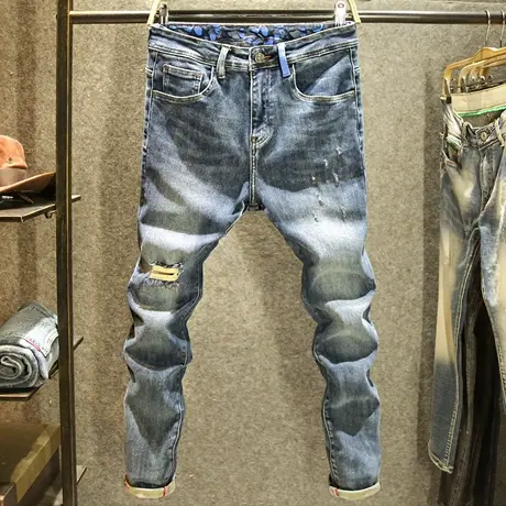 秋季破洞补丁牛仔裤男款修身小直筒裤子高端个性印花水洗耐磨长裤图片