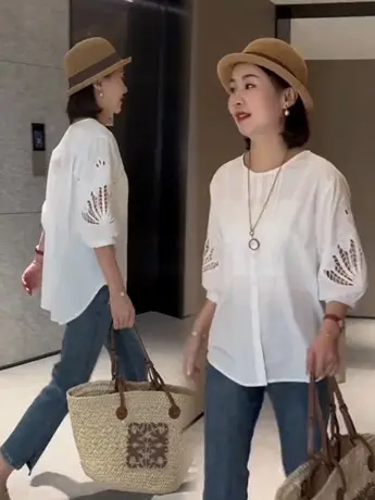 欧货设计感重工镂空刺绣灯笼袖上衣女2023春夏新款不规则白色衬衫图片