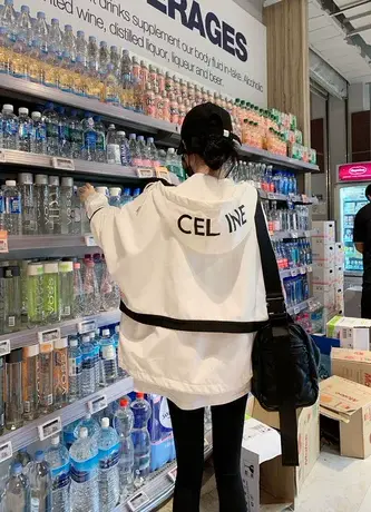 2023年早春棒球服新韩版宽松风衣字母拼接时尚显瘦连帽工装外套女商品大图