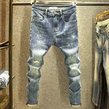 秋冬款蓝色大牌印花牛仔裤男款修身小脚弹力裤子潮牌破洞百搭长裤图片