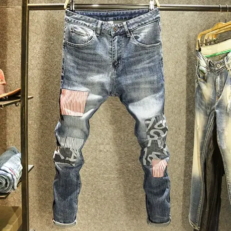 高街帅气潮牌刺绣牛仔裤男款修身小脚裤秋冬季潮流拼接补丁裤子男商品大图