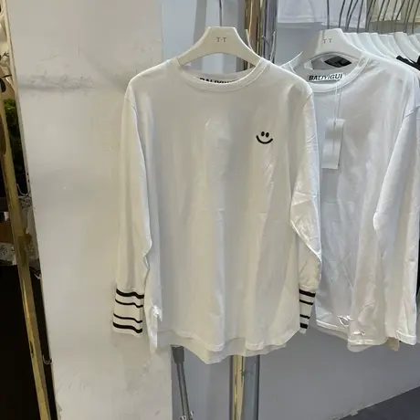 2023春秋装新款圆领口袋卡通图案拼色袖宽松长袖T恤女打底衫上衣图片