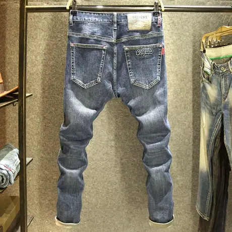 高端青年时尚百搭牛仔裤男款弹力修身小脚裤潮牌水洗耐磨韩版裤子图片