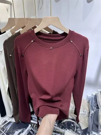 欧货铆钉别致纯色羊绒软糯质感不规则下摆圆领针织T恤打底衫女秋商品大图