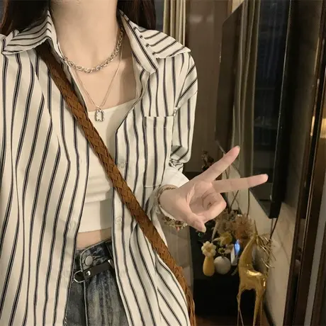 法式条纹长袖衬衫女春秋季新款设计感小众宽松慵懒风气质上衣外套图片