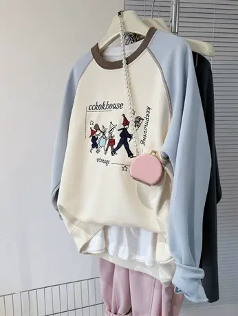 人物刺绣宽松上衣2024春季新款撞色洋气小众明线插肩袖卫衣女薄款图片