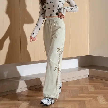 唐狮春季新款女休闲裤宽松蕾丝拼接蝴蝶结甜美风黑色长裤商品大图