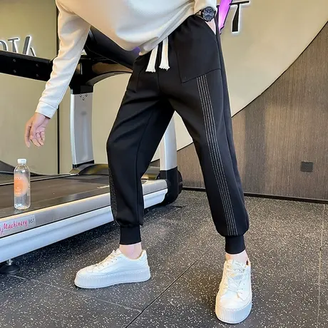 春秋季男休闲束脚哈伦长裤小众时尚条纹拼接宽松潮男运动九分卫裤图片