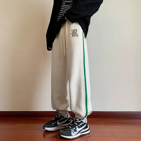 秋季秋冬款运动卫裤男士束脚宽松紧腰弹力潮牌侧边条纹休闲长裤子商品大图