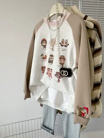 满印印花洋气百搭春装上衣女韩系拼色小众设计感宽松圆领插肩卫衣商品大图