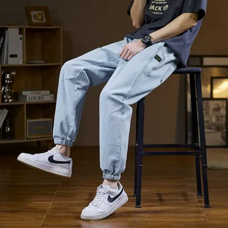唐狮春秋季牛仔长裤男宽松薄款束脚小标切割线浅色时尚潮牌裤子图片
